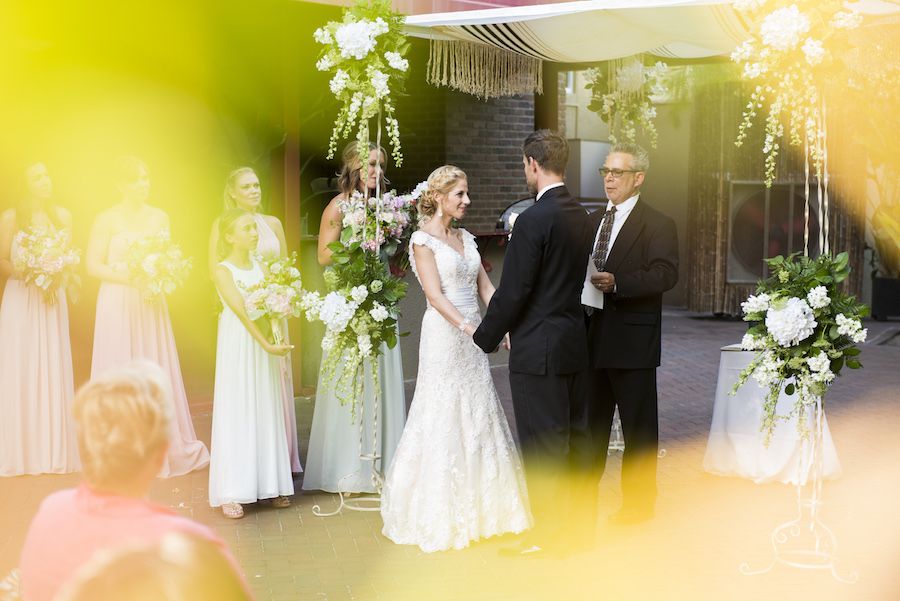 Bride and Groom Exchange Wedding Vows | St. Petersburg Wedding Venue Nova 535