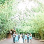 Wedding Bridal Party Portraits with Turquoise Blue Bridesmaid Dresses and Orange Wedding Bouquets | Downtown St. Pete Wedding Venue NOVA 535 Event Space Bamboo Garden