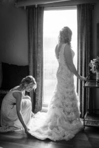 Bride in layered lace wedding dress