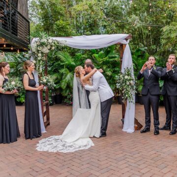 Elegant White and Greenery Wedding Ceremony in Bamboo Courtyard | Tampa Bay Event Venue Nova 535