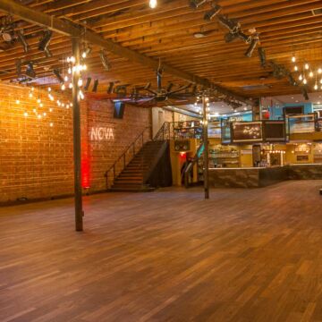 Empty interior of historic wedding venue NOVA 535 unique event space in beautiful downtown Saint Petersburg, Florida. Facing northeast