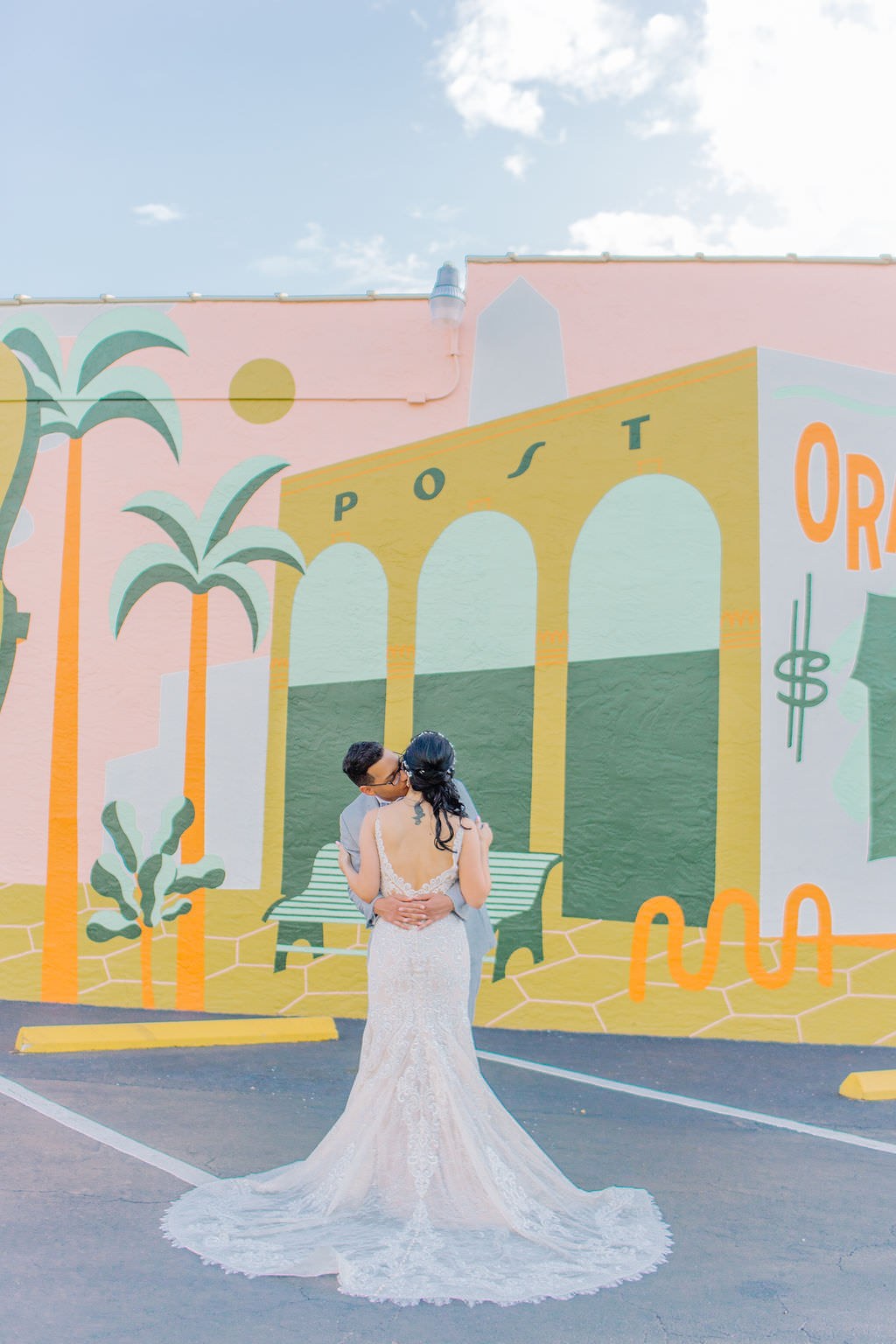 St. Pete wedding portraits in front of mural