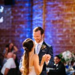 Industrial Brick Wall Ballroom First Dance Wedding Photo with Blue Uplighting and Monogram GOBO | Unique DTSP Wedding Venue NOVA 535
