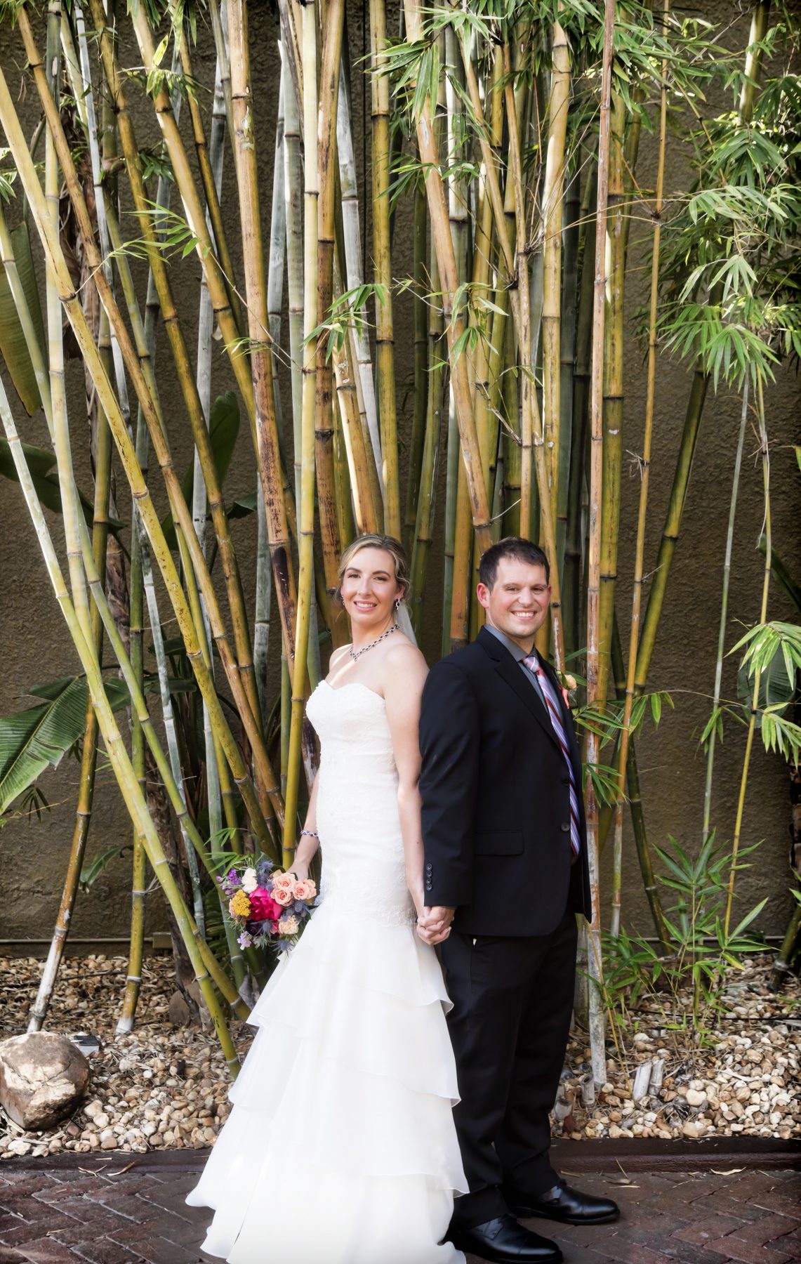 Florida Bride and Groom in romantic bamboo garden at Downtown St. Pete Unique Wedding Venue NOVA 535