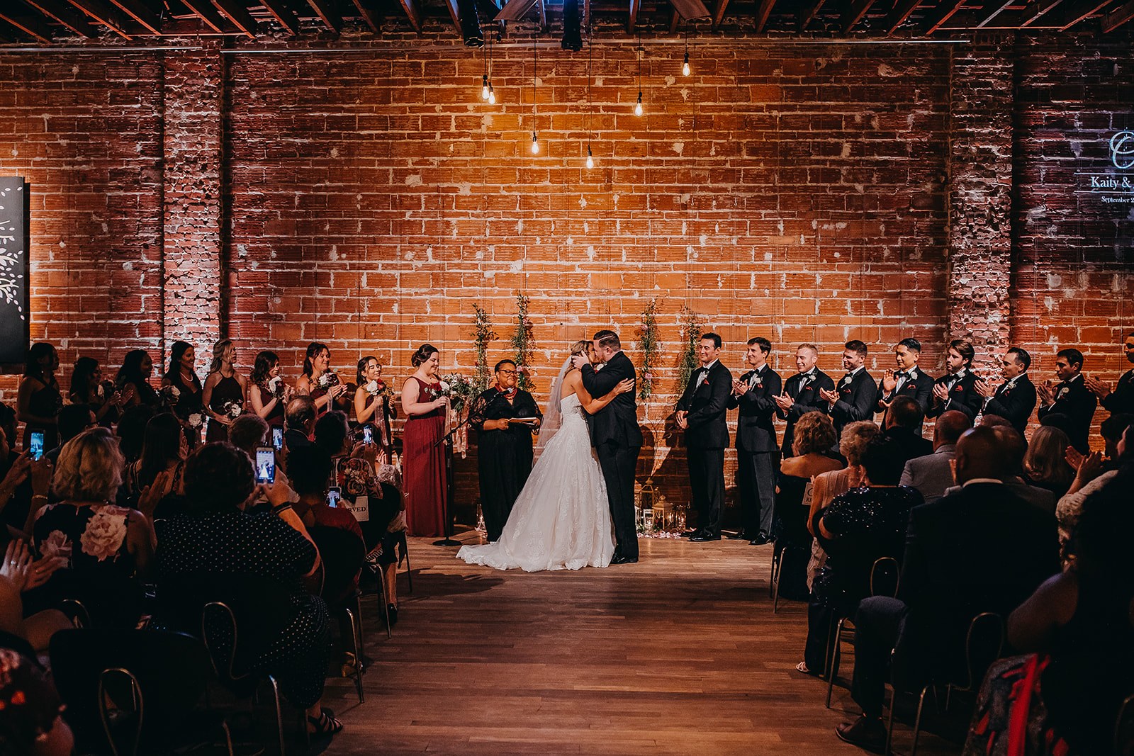 Urban Downtown St Pete Wedding with brick wall ceremony backdrop and string lights | Tampa Bay Unique Wedding VenueNOVA 535