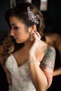 Bride in embellished strapless wedding dress with rhinestone headpiece